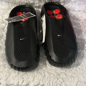 Nike Men's Black Slip-On Athletic Clogs with Red Insole Accents